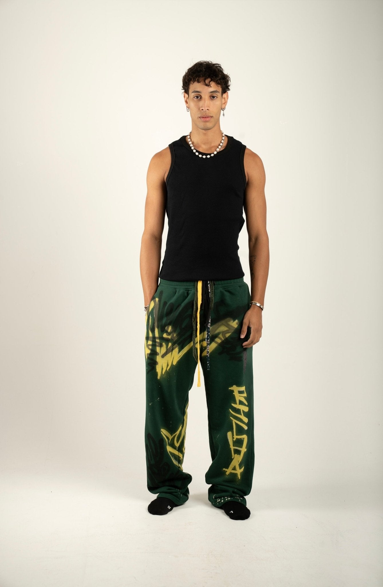 Olive Spray Paint Sweatpants - Richa UAE